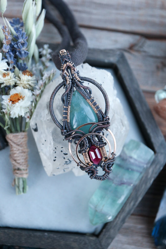 Aquamarine and Garnet in Copper with Gold Accents